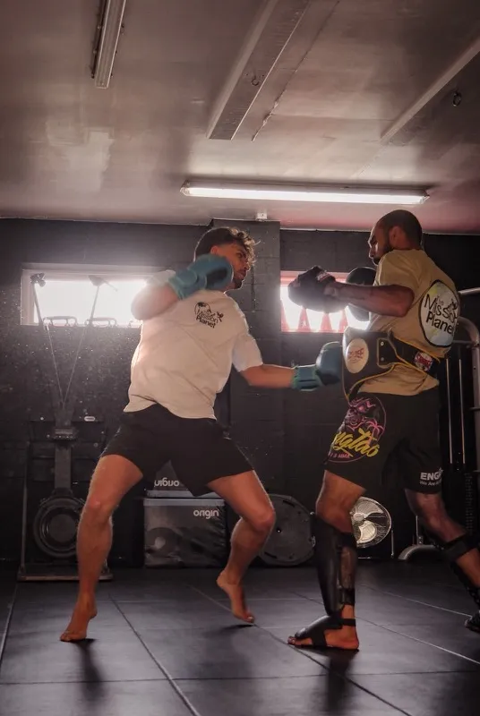 A martial arts session in a gym