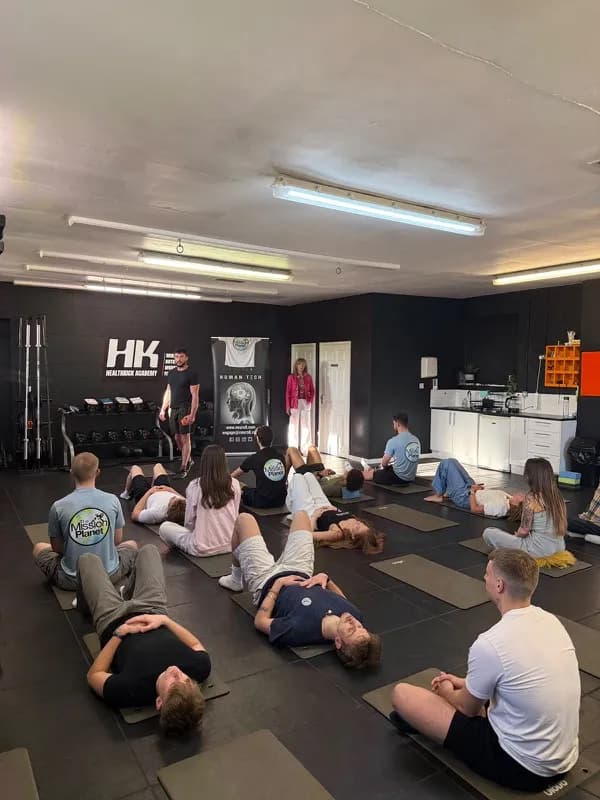 A floor and stretching session in a gym